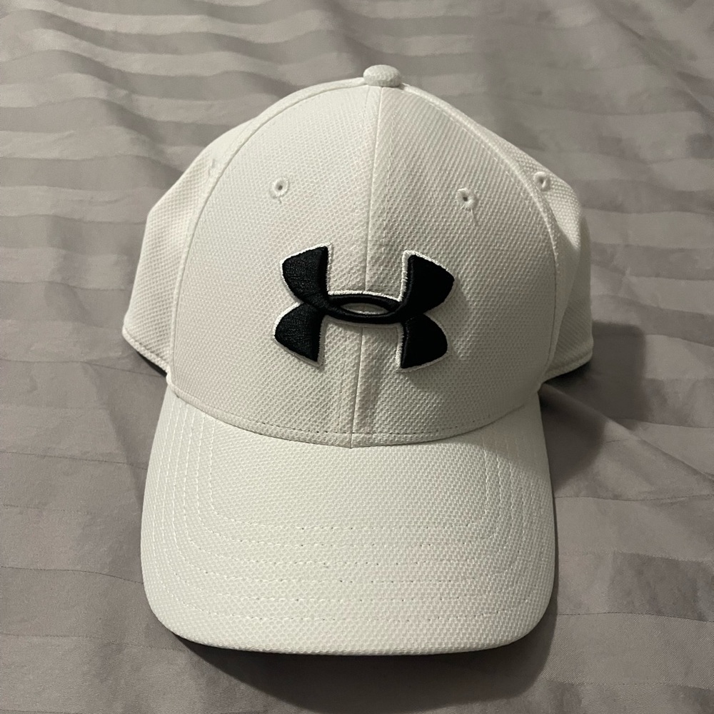 Under Armor ball cap, L/XL, 100% polyester, like new condition.